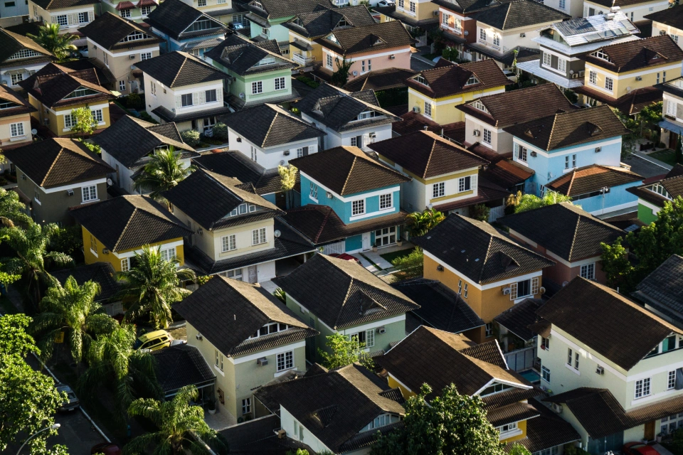 An aerial view of a block of colourful houses.