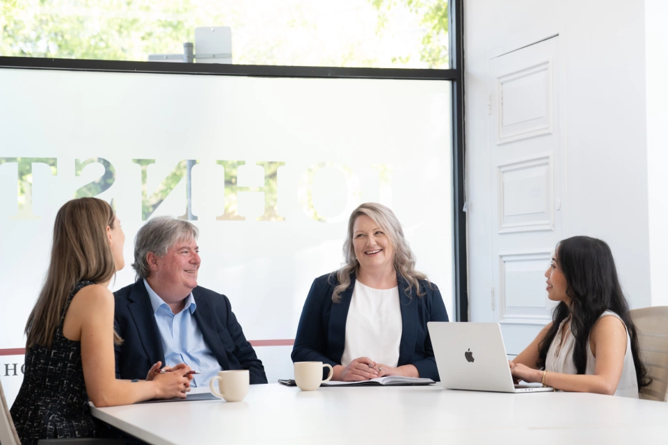Clare team johnston withers lawyers